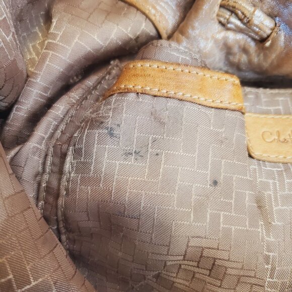 Cole Haan PHOEBE Distressed Leather Hobo Purse METALLIC ROSE Braid Trim Argento - Picture 9 of 9